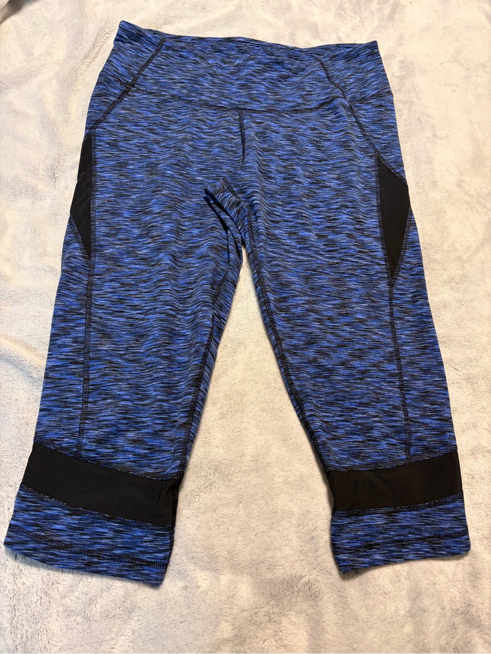Striking Shambhala heathered black & blue  capris.
